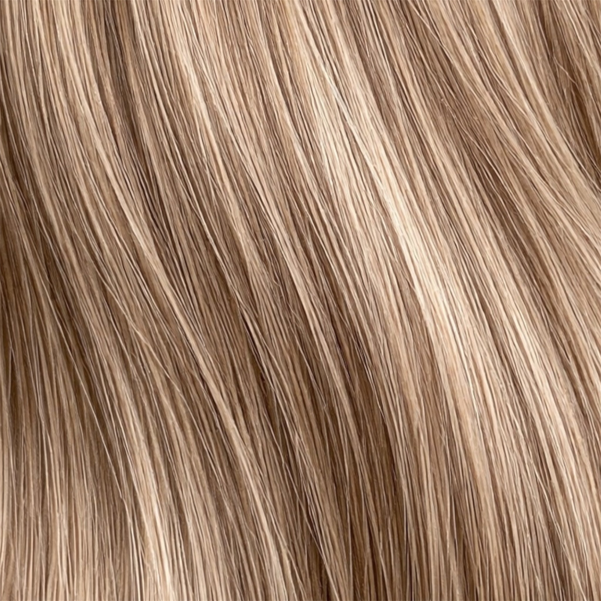 Close-up of pearly deep blonde-brown hair strands