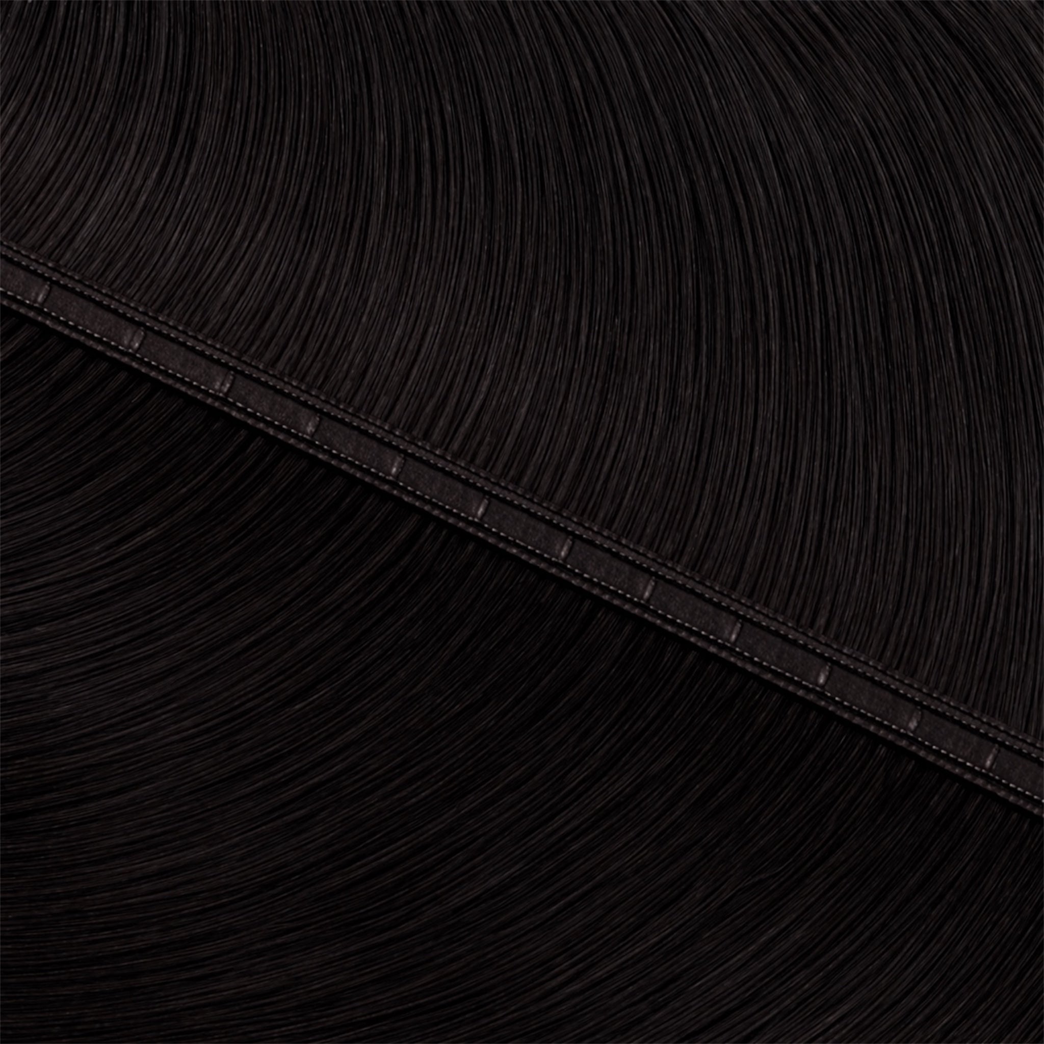 Close up picture of hair extensions with dark dark deep brown tones
